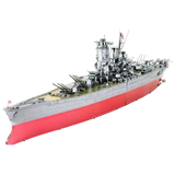 Assembled metal model of a Yamato Battleship with red hull on a white background