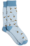 A pair of socks. They are light blue with illustrated bees all around them. The top, heel, and toes of the sock is all a darker blue.