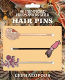 Hair pins of a nautilus, a squid, and an octopus.