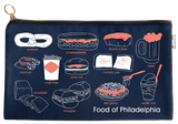 A denim pencil pouch that has different food from Philadelphia illustrated on it. We can see illustrations of a soft pretzel, cannolis, crab fries, scrapple, cheesesteaks, pork roll, hoagies, snack cakes, tomato pie, red gravy, beer, and water ice. There is white text at the bottom that says, "Food of Philadelphia."