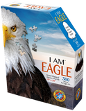 A puzzle box with text that says, "I Am Eagle. Head-shaped jigsaw puzzle. 17" x 24". 300 pieces. For ages 10+." There is a picture of an eagle on the side of the box with puzzle pieces coming out of it.
