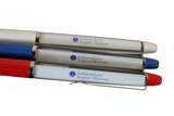Three pens next to each other. The bases of each individually are white, blue, and red. Each has a floating logo that says "Independence Seaport Museum" with a small anchor in a circle surrounded by stars next to it.