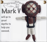 A string doll of a diver. He is wearing a diving helmet, a brown shirt, a black harness, white pants, and brown shoes. Text on the side reads, "Mark V will go to great depths to help you succeed."