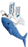 A string doll of a whale. It has a blue body with a black eye and small smile, and a stream of white water coming out of its blow hole. A tag shows that its name is, "Moby."