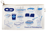 A white pencil pouch that has different food from Philadelphia illustrated on it. We can see illustrations of a soft pretzel, cannolis, crab fries, scrapple, cheesesteaks, pork roll, hoagies, snack cakes, tomato pie, red gravy, beer, and water ice. There is white text at the bottom that says, "Food of Philadelphia."
