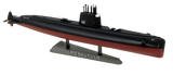 A fully built model of the USS Nautilus. It has a black top and a red bottom and is sitting on top of a stand that reads, "USS Nautilus" on it.