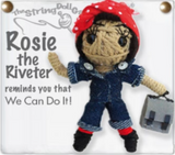 A Rosie the Riveter string doll. She has tan skin, a red and white polka-dotted headband, a blue jumpsuit with a grey undershirt, red socks, and black boots. There is text next to her that says, "Rosie the Riveter reminds you that We Can Do It!"