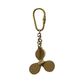 Gold propeller-shaped keychain 