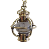 Closeup of a bronze lantern keychain
