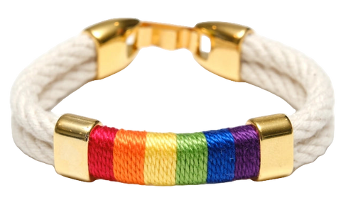 White rope bracelet with rainbow pattern and gold accents
