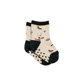 A pair of beige crew socks with dark green cuffs, heels, and soles, featuring a pattern of ducks and reeds