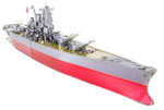 Assembled metal model of a Yamato Battleship with red hull on a white background