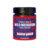 Jar of Wild Mushroom Chili Sauce with a red label
