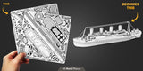 Card with ship design on one side and completed ship model on the other, held by a hand.