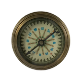 Vintage-style compass with decorative elements