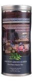 Tea canister with a traditional scene illustration and 'Ancient Green Leaves' text on a gray background