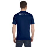 A man with his back facing the camera. He is wearing a navy-blue shirt with text that says, "Independence Seaport Museum" which has an icon of an anchor is a circle surrounded by stars.