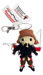 A string doll of the pirate black beard. He has a brown captain's hat, a long black beard, a red coat, brown pants, red socks, and black shoes with a silver buckle. He is holding a wire sword and gun. His tag reads that his name is "Blackbeard."