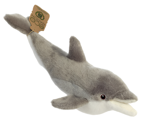 A plush dolphin with a fuzzy grey and white body, and black and brown eyes. It has a tag on its fin that reads, "Eco nation."