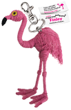 A string doll of a flamingo. It is all pink with a yellow and black eye. Its tag shows that its name is, "Finley."