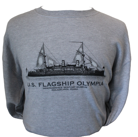 A grey sweatshirt with a black and white depiction of the U.S. Olympia on it. There is black text underneath it that reads, "U.S. Flagship Olympia. Independence Seaport Museum. Philadelphia, Penna." 