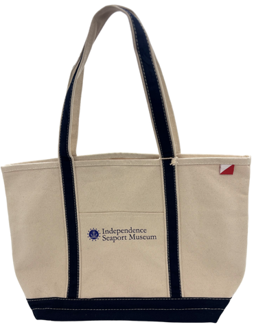 Medium canvas tote with navy bluebottom and straps with logo of Independence Seaport Museum in blue