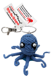 A string doll octopus. He is blue with black and white eyes. His tag states that his name is, "Otto the octopus." 