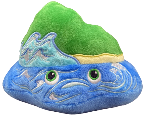 Plush toy shaped like a rock with a green top and blue bottom with green eyes