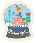 An illustrated sticker of Philadelphia landmarks inside of a snow globe. The bottom is grey and says in white text, "Philadelphia." 