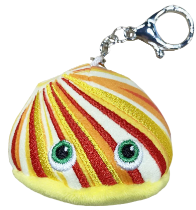 Plush yellow keychain with red and white stripes and green eyes.