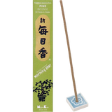 Pine incense packaging with a single incense stick in a blue and white floral holder.
