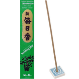 Cedarwood incense packaging with a single incense stick in a blue and white floral holder.