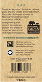 Back of a sock tag with text about supporting national parks and Fairtrade certification.