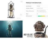 Product packaging of a metal model diving suit  kit with assembly instructions and dimensions.