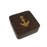 Wooden box with a gold anchor emblem 
