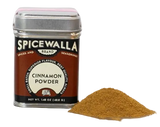 Spicewalla cinnamon powder canister with a small pile of cinnamon powder 
