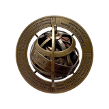 An antique brass armillary sphere and zodiac equator astronomical instrument, featuring engraved markings and a central rotating sphere