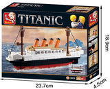 Sluban brand Titanic building block set in its retail box, showing a detailed model ship on the front with dimensions labeled: 23.7cm width, 18.